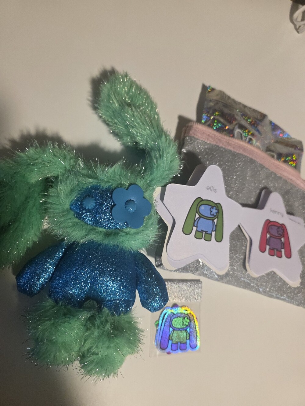 JuJu ellis Sea Green & Blue Glitter Plush CJ Hendry with Flower Accent